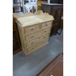 A pine chest of drawers