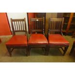 A set of three Victorian Aesthetic Movement oak dining chairs, manner of Gillows of Lancaster and