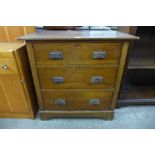 An Edward VII oak chest of drawers