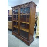 A mahogany two door bookcase