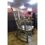 A Victorian beech farmhouse rocking chair