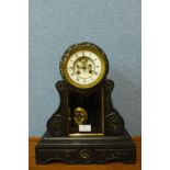 A 19th Century French Belge noir mantel clock, with open escapement, 38cms h