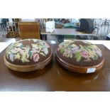 A pair of Victorian style mahogany needlework footstools