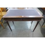 A French Empire style mahogany and gilt metal writing table