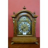 A George III style burr walnut and gilt metal bracket clock, 44cms h