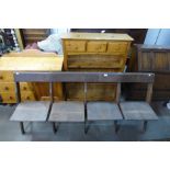 An early 20th Century oak folding bench