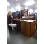 A teak dressing table and stool