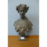 An Art Nouveau style resin bust of a lady