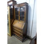 An oak bureau bookcase