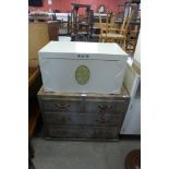 A painted blanket box and a pine chest of drawers