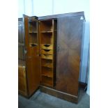 A Compactom oak fitted wardrobe