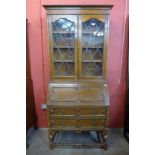 An oak bureau bookcase