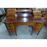A Victorian Sheraton Revival satinwood and marquetry inlaid writing desk, 98cms h, 120cms w, 60cms d