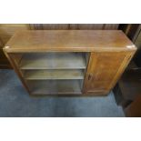 A Heals style Art Deco light oak bookcase, 77cms h, 101cms w, 31cms d
