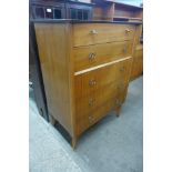 A walnut chest of drawers