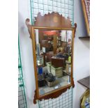 A George II style inlaid yew wood mirror, 98cms h