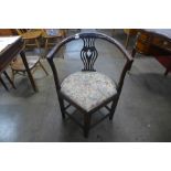 A Chippendale Revival mahogany elbow chair