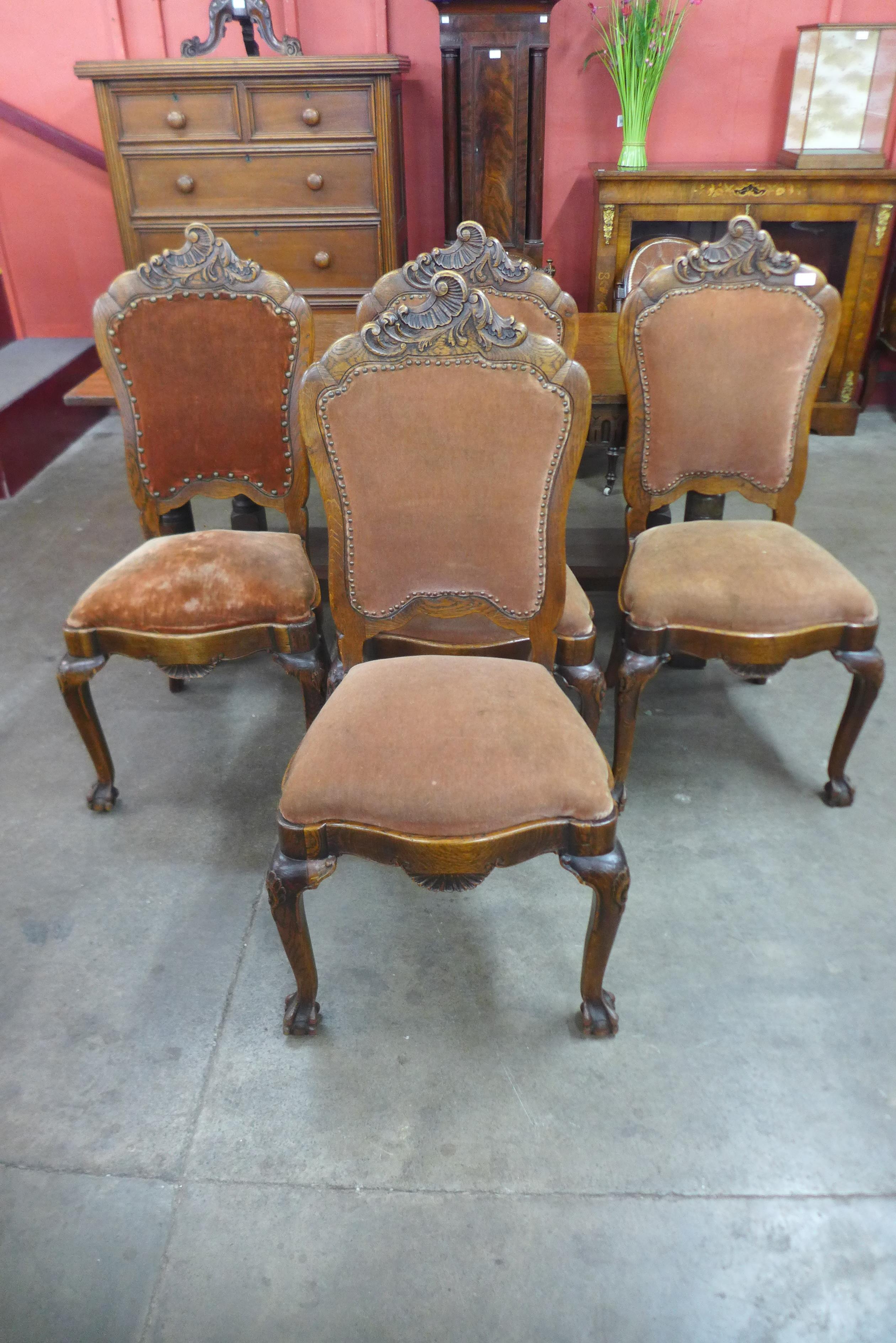 A set of four 19th Century French carved oak dining chairs