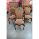 A set of four 19th Century French carved oak dining chairs