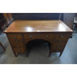 An Edward VII inlaid mahogany desk, 74cms h, 114cms w, 61cms d