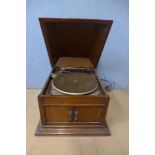 An oak table top gramophone (converted for electricity)