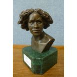 A French style bronze bust of a woman, on green marble socle, 14cms h