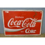 A Coca-Cola enamelled advertising sign