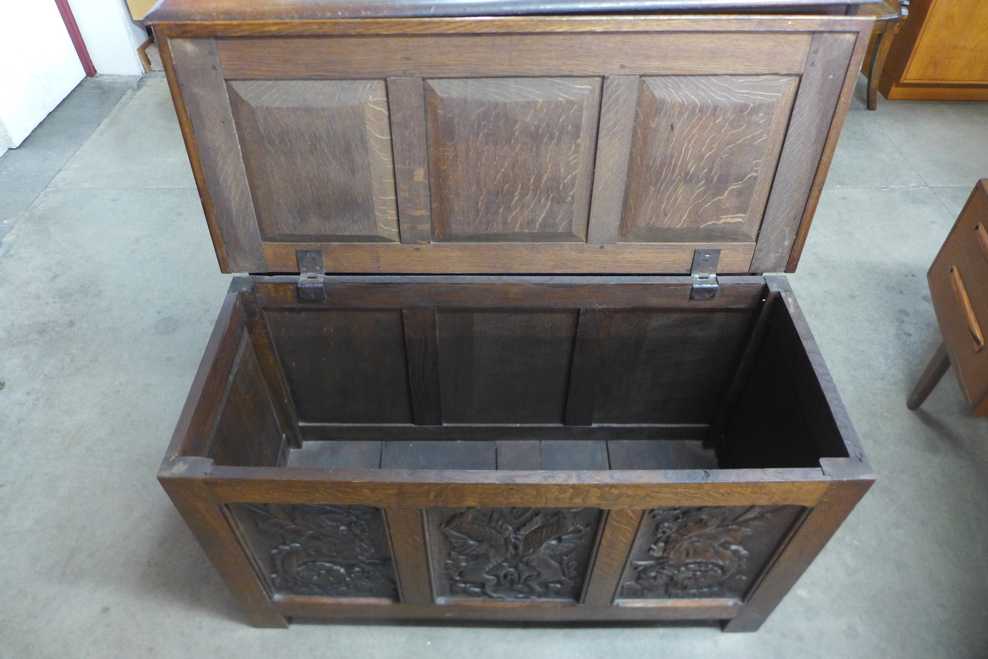 A 17th Century style carved oak coffer, 65cms h, 116cms w, 49cms d - Image 3 of 3