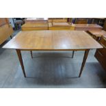 A McIntosh teak extending dining table