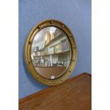 A gilt convex mirror