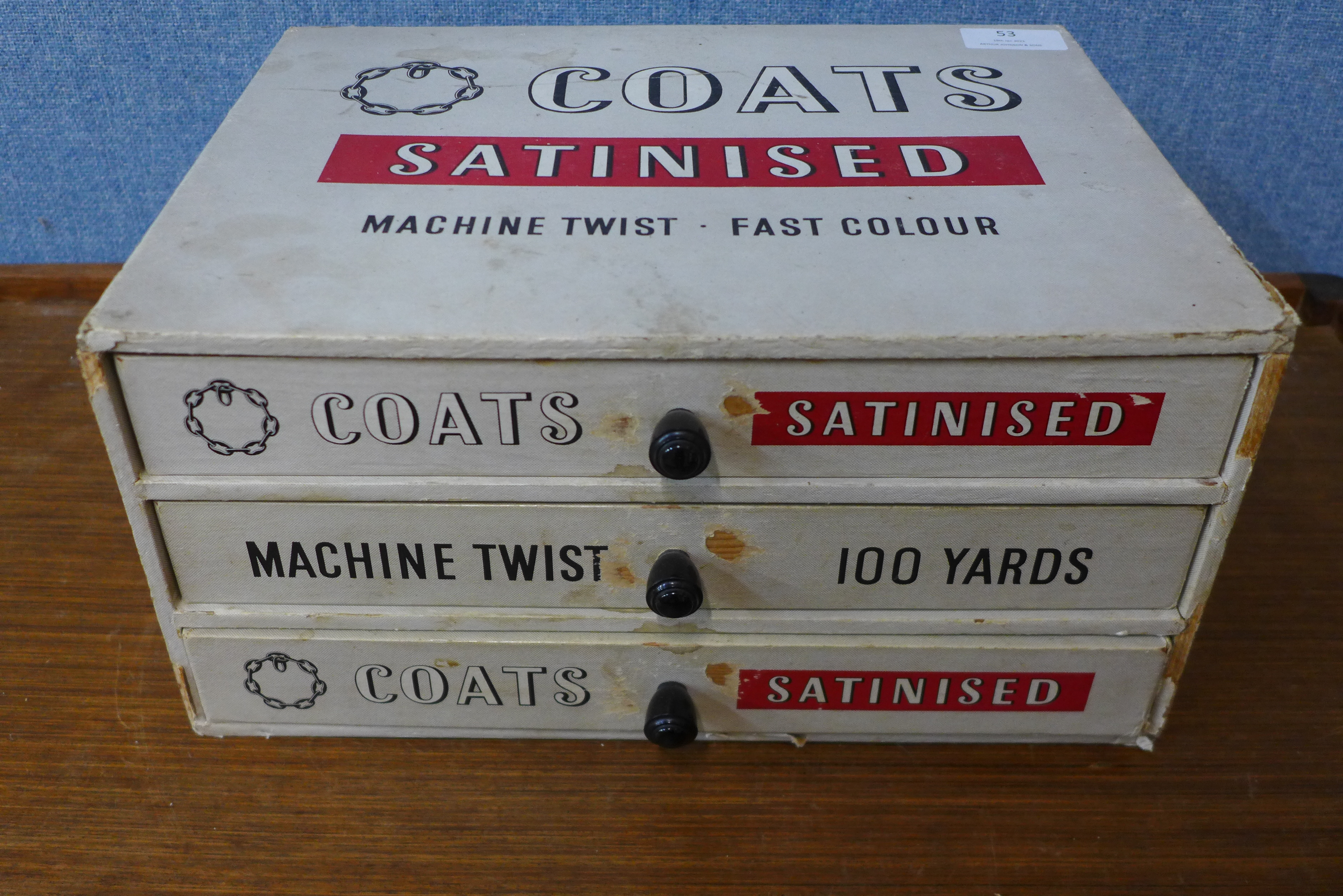 A Coats Satinised haberdashery shop chest, 15cms h x 31cms w