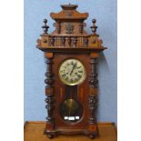 A 19th Century walnut Vienna wall clock, 86cms h