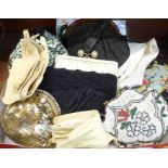 A collection of vintage purses, evening bags, two pairs of opera gloves, one other pair, a pair of