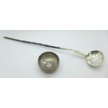 A ladle with whalebone handle and a ladle bowl only inlaid with a George II coin