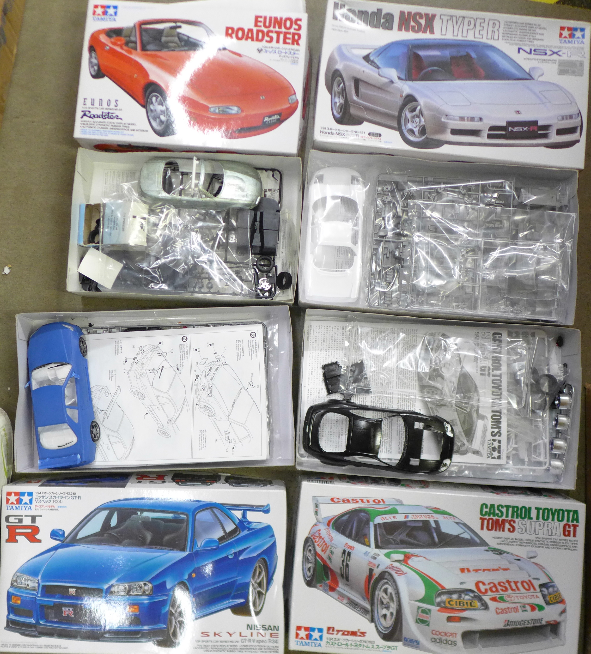 Four Tamiya model kits, Eunos Roadster, NSX Type R, Nissan GTR Skyline and Castrol Toyota Tom's