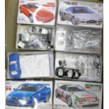 Four Tamiya model kits, Eunos Roadster, NSX Type R, Nissan GTR Skyline and Castrol Toyota Tom's