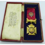 A 9ct gold RAOB medal with gilt metal mounted ribbon, weight of medal 13.7g