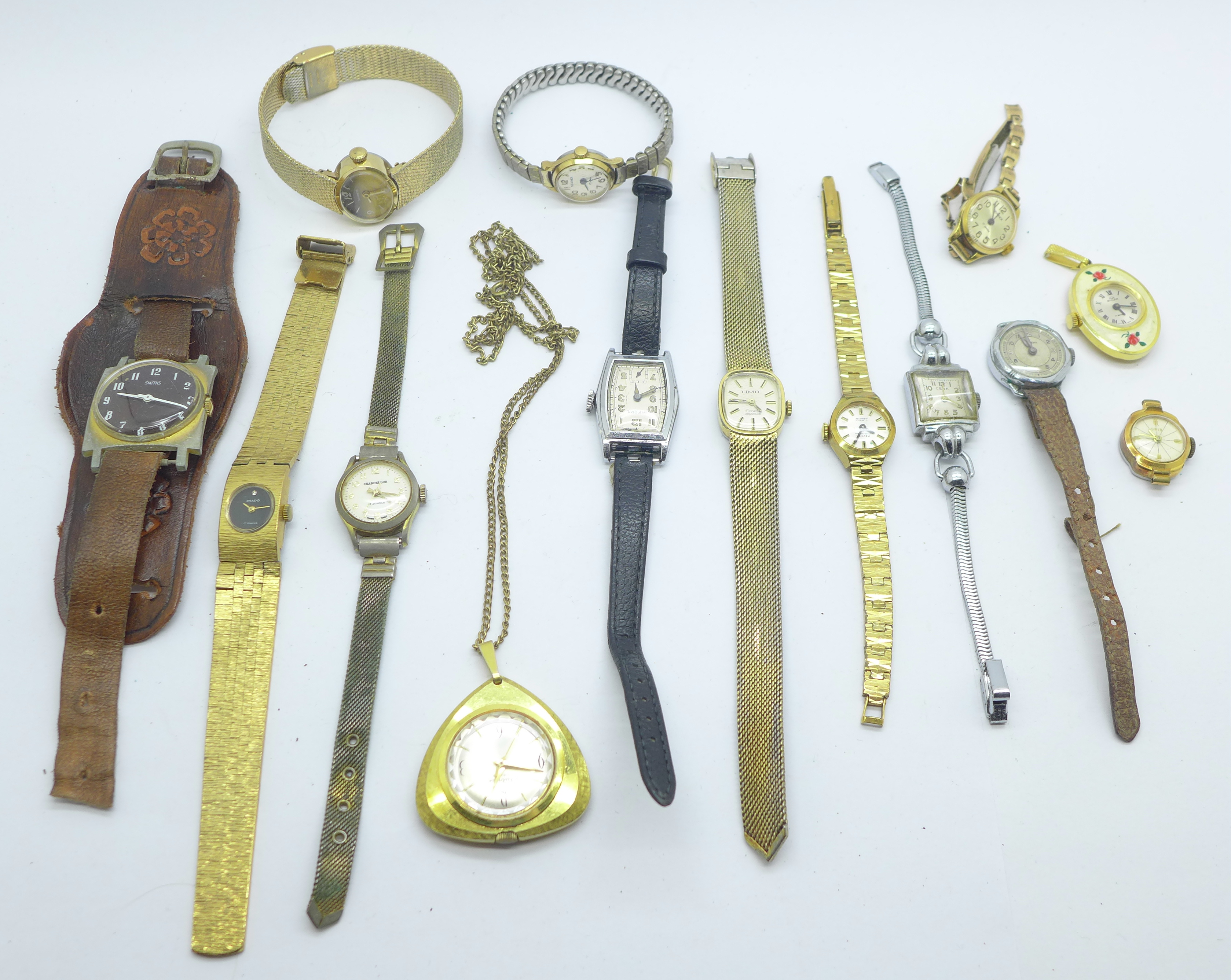 Fourteen manual wind wristwatches and pendant watches including Buler, Bifora, Smiths, etc.