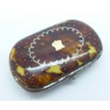 A tortoiseshell pique purse, 48mm x 77mm