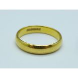 A 22ct gold wedding ring, 4.7g, P