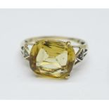 A 9ct gold and citrine ring with diamond shoulders, 1.9g, O