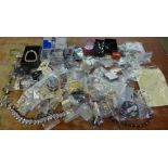 A collection of unused and packaged fashion jewellery