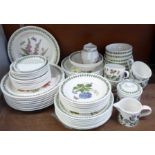 A collection of Portmeirion dinnerwares, nine dinner plates (three decorated), seven side plates,