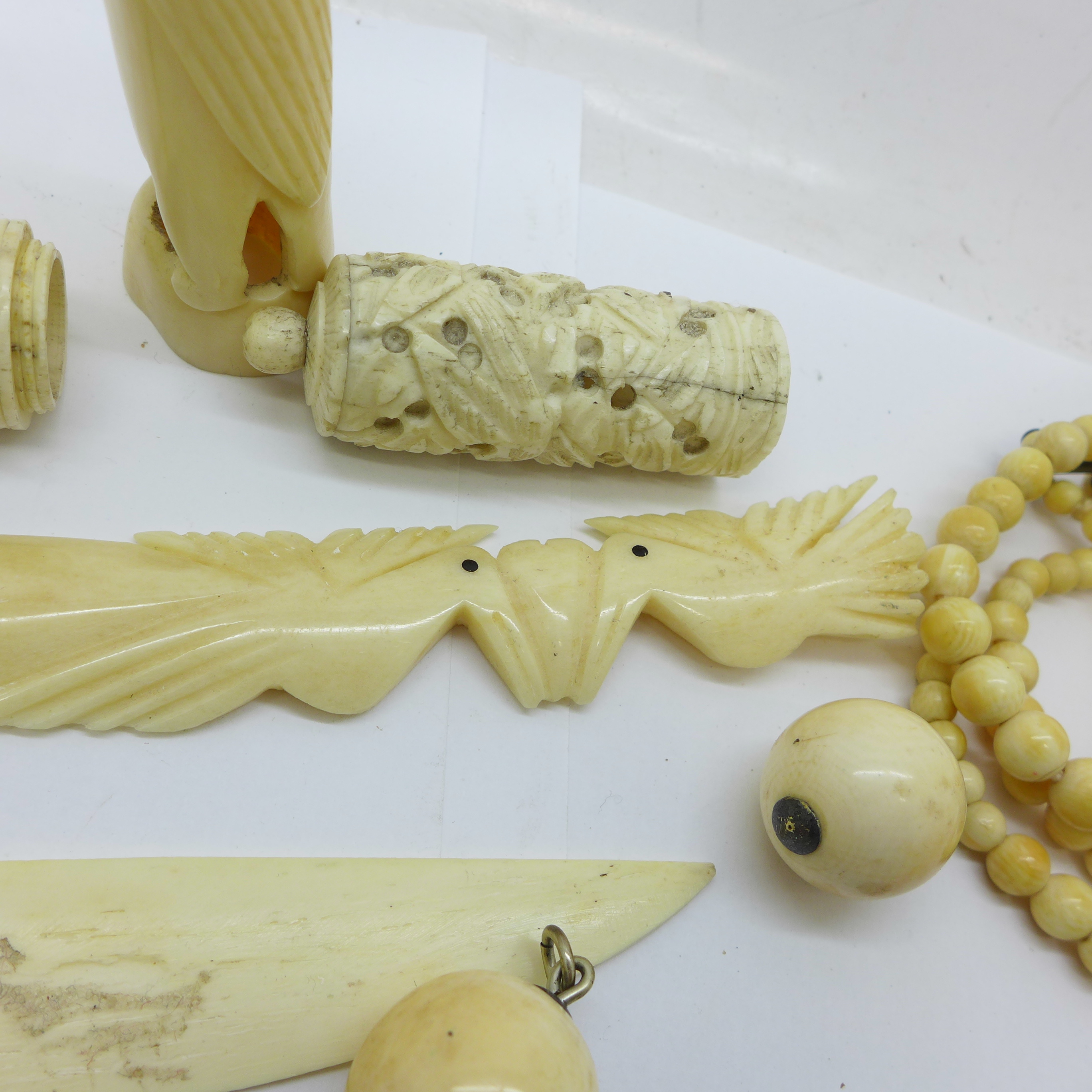 Antique ivory jewellery including two bead necklaces, carved penguin, needle case (a/f), and two - Image 3 of 3