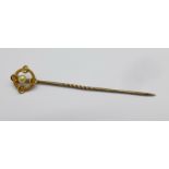 A 15ct gold and pearl stick pin, in a Garrard & Co. box
