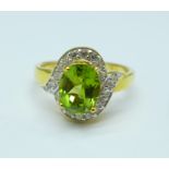 A silver gilt, peridot and zircon cluster ring, P
