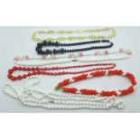Six vintage 'new-old stock' necklaces including Czechoslovakian glass