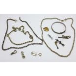 Two silver necklaces, a silver bangle and a silver brooch, one other necklace, a 9ct gold back and