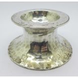 A hammered silver pin dish or stand, Birmingham 1912, S. Blanckensee & Son Ltd., 67g, diameter of