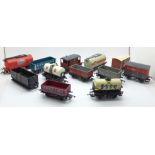 Twelve OO gauge rail wagons including seven Hornby